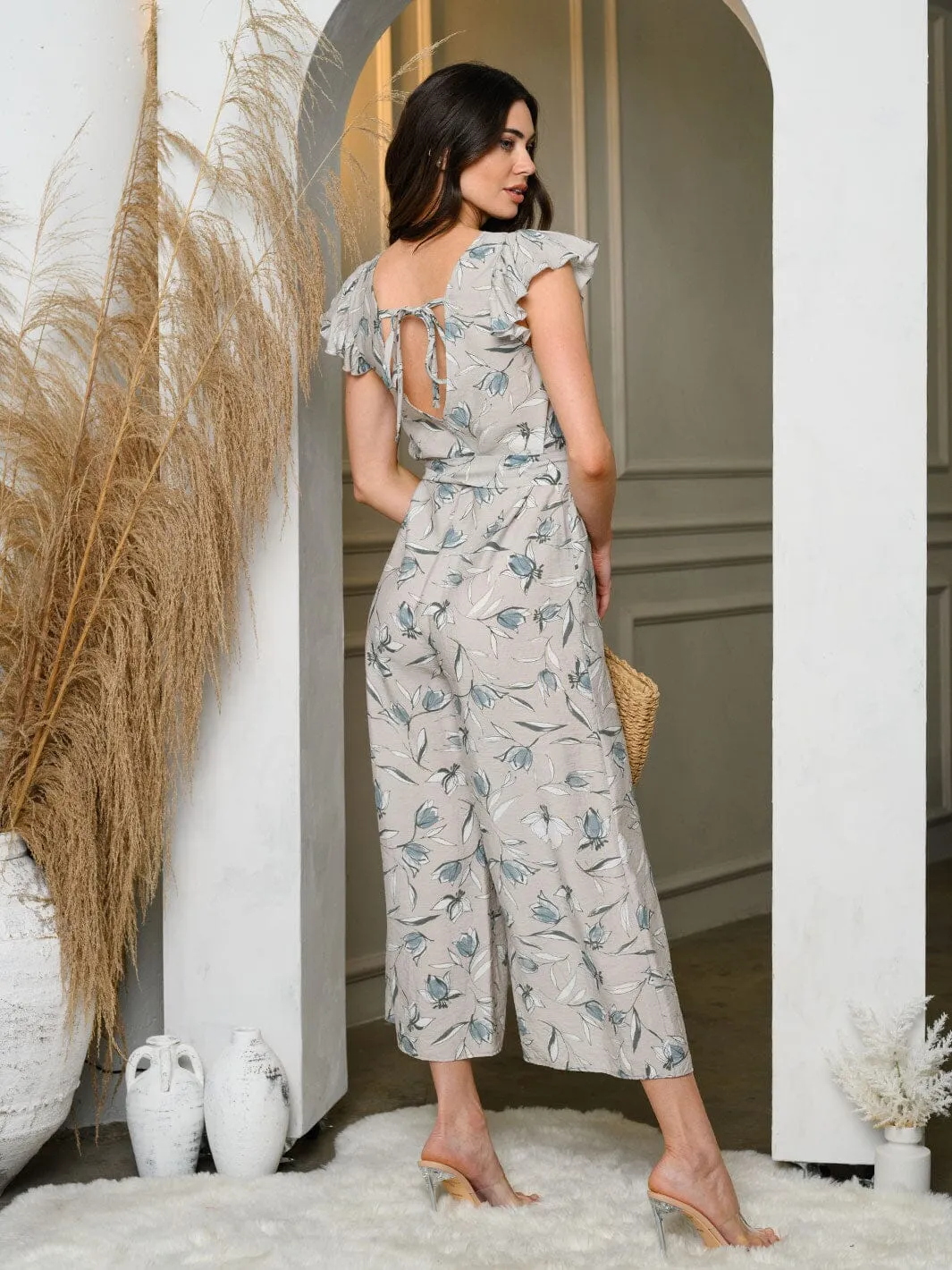 WOMEN'S RUFFLE SLEEVELESS POCKETS SELF TIE FLORAL JUMPSUIT